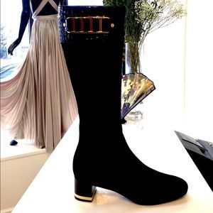 Tory Burch Riding Boots with  minor wear & tears.